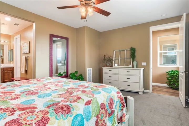 Primary Bedroom Easily Accepts King-Size Furniture; Well-Lighted Primary Bath Is To Left.