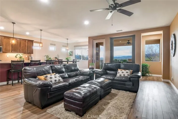 View of Great Room From Elevator Door Or Stairwell; Note Easy-To-Maintain Acoustic Flooring