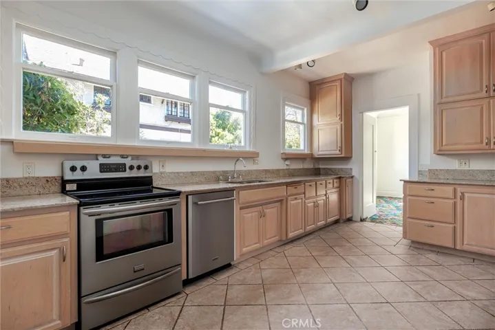 Kitchen with doorway to dining room.