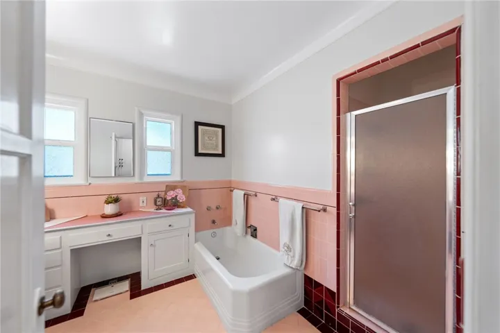 Timeless hall bath with separate tub and shower