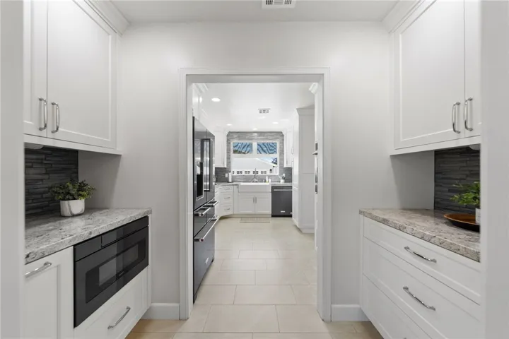 Butler's pantry area with lots of storage