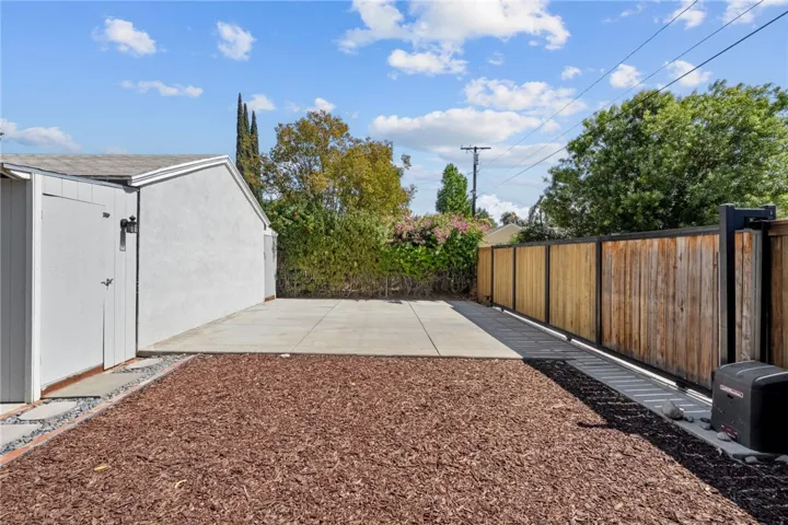 Gate from the back of the property to park behind the garage if needed