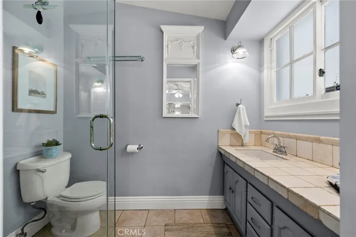 Primary bathroom with beautiful stone counters