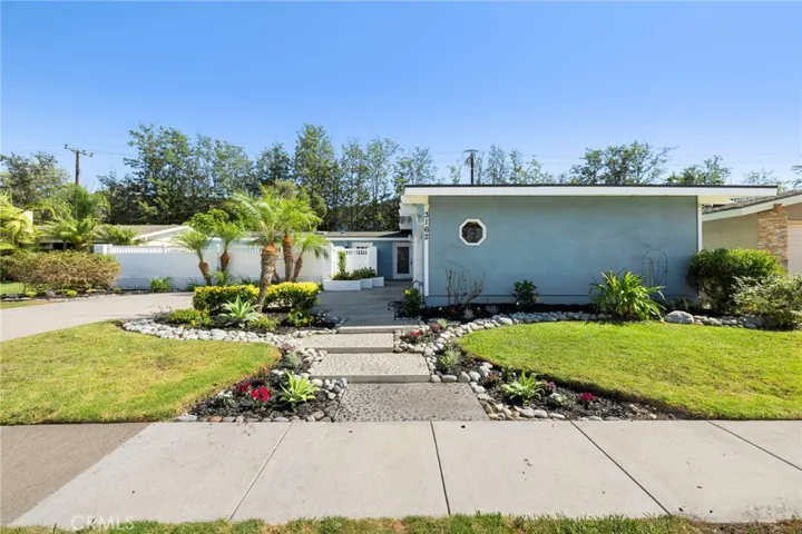 Front Walkway with flowers and cobblestone
