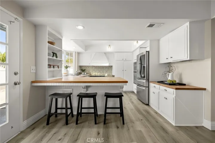 Warm Kitchen and barstools for easy dining