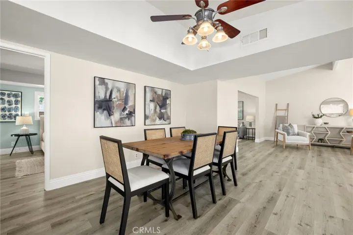 Dining area to open concept and access to primary suite