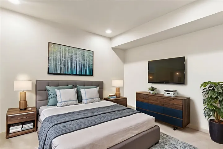 Downstairs Bedroom (next to Full bath). Virtually staged.