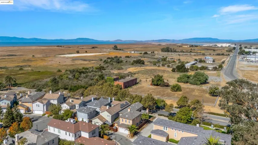 Aerial view of residential area with mountains