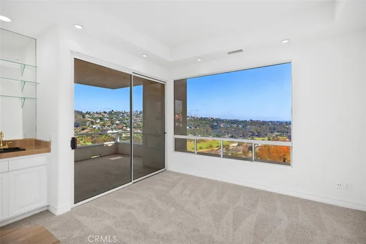 Beautiful Ocean views/golf course view from sitting area and private deck.