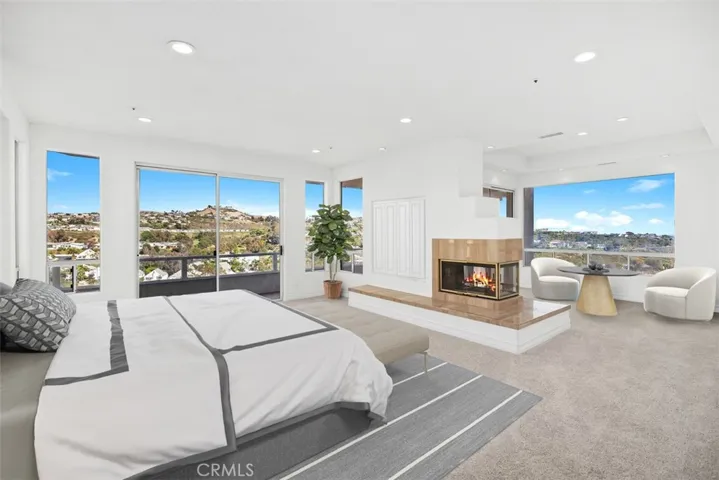Primary Bedroom w/ sitting area-virtually staged