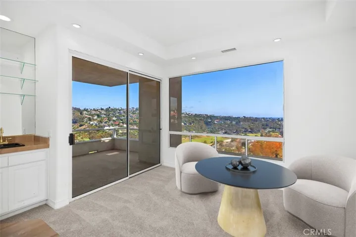 Sitting area in Primary with private deck