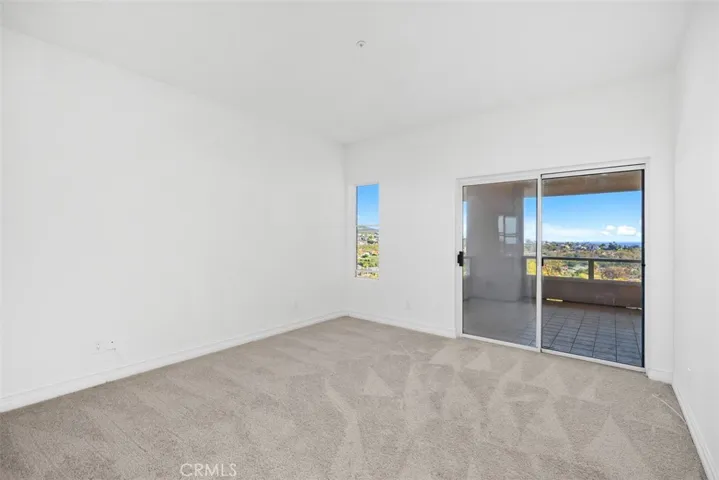 Secondary bedroom with deck