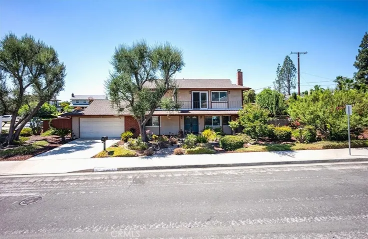 Front of home. See drought friendly yard