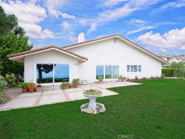 Back Elevation with Open Patio & Grassy Backyard