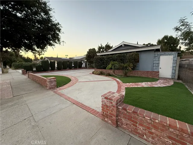 Mature landscaping throughout & hardscape