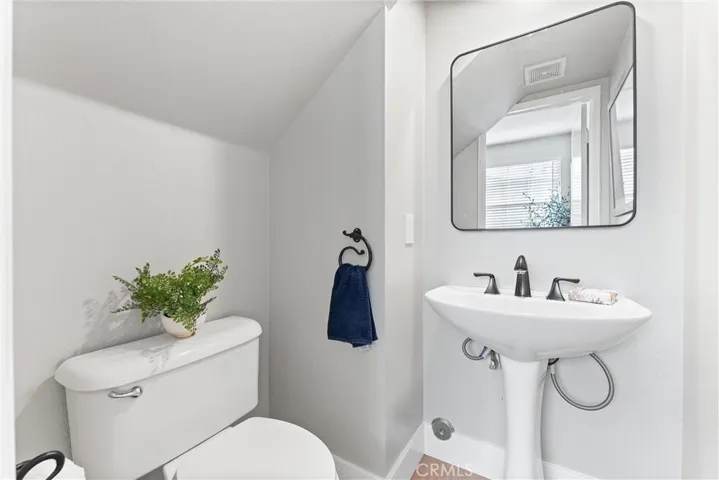 Downstairs half bath off the den/study