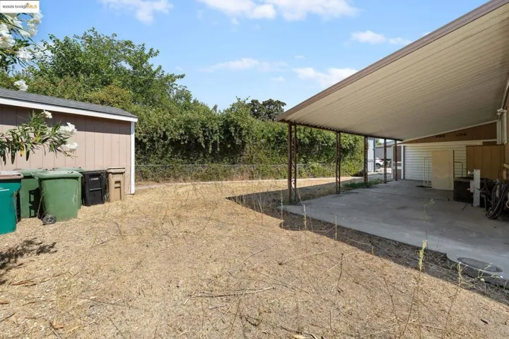 View of yard with a patio