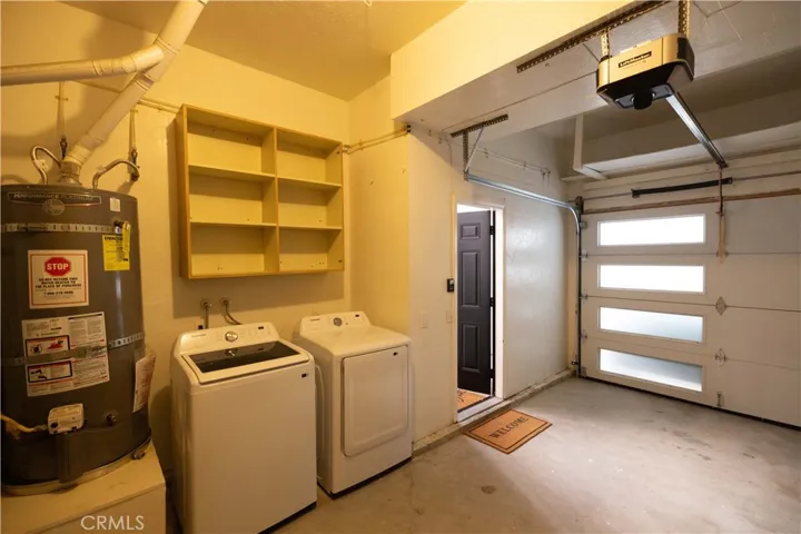 Laundry room and shared storage space.