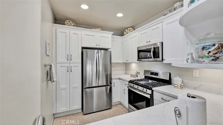 Soft close cabinets and drawers, quartz countertops, stainless steal appliances