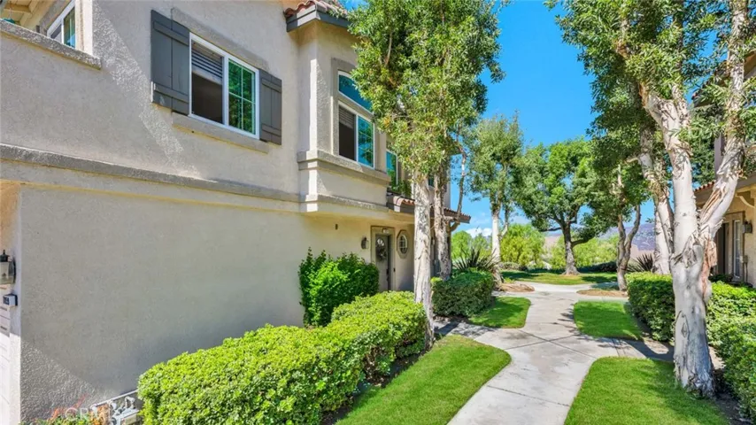 Tree lined walkway to your front dor