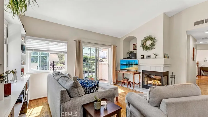 Living room incudes private balcony