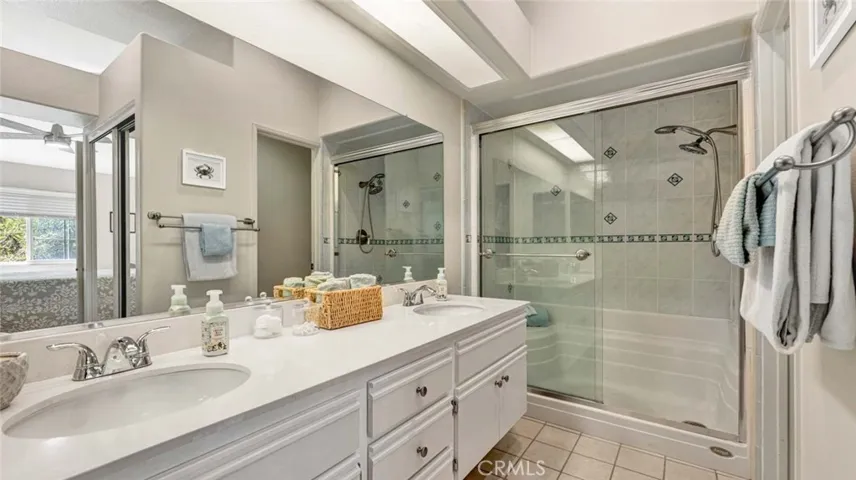 Dual sink vanity with remodeled shower