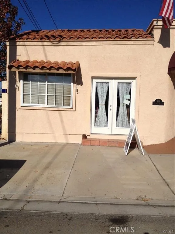 Front of building. Public parking across the street.