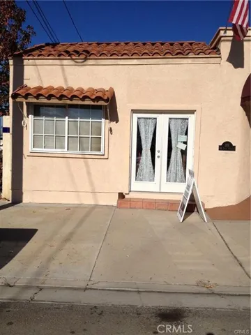 Front of building. Public parking across the street.