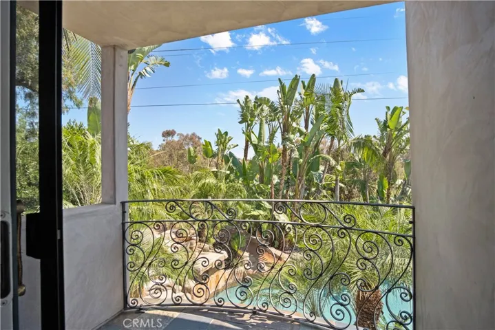 Balcony with view of pool