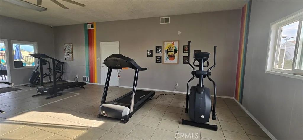 Located next to the pool is the gym