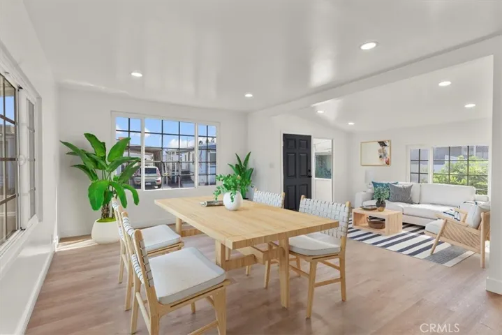 Living Room What amazing Views and Light this Room Has 15621 Beach Blvd Space 108, Westminster. Staged photo