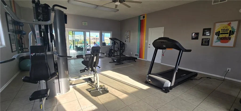 Located next to the pool is the gym
