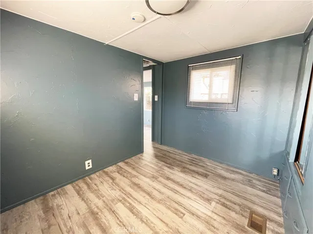 Bedroom facing the door