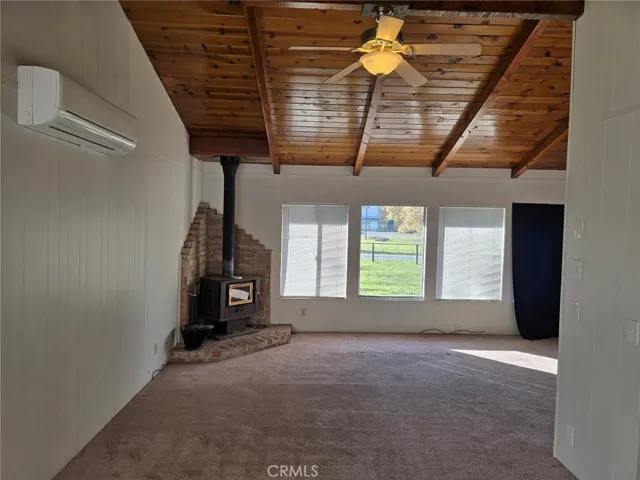 Looking west from dining area into living room