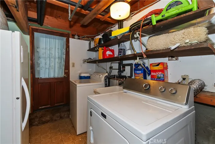 Bottom Level Laundry Room With Outside Access