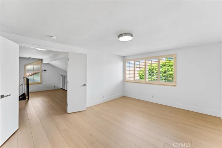 Primary bedroom with brand new Luxury Planking flooring