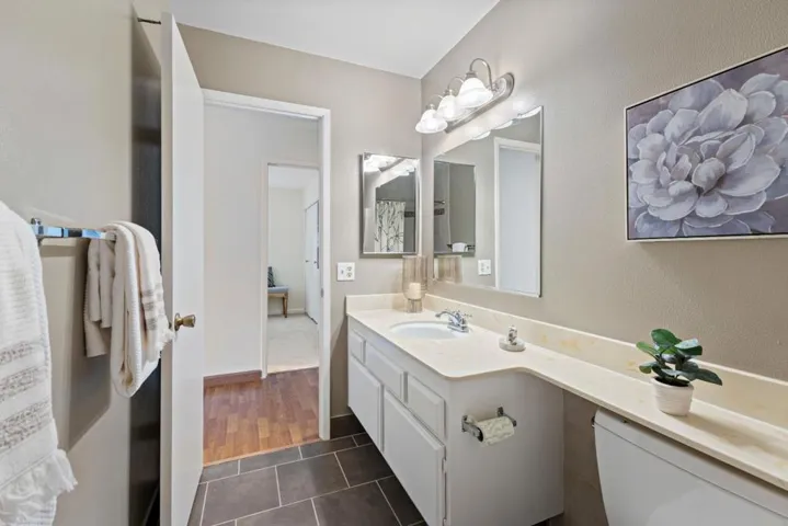hall bath is across from the first bedroom