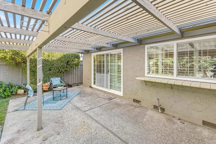 slider and kitchen window overlooking back patio