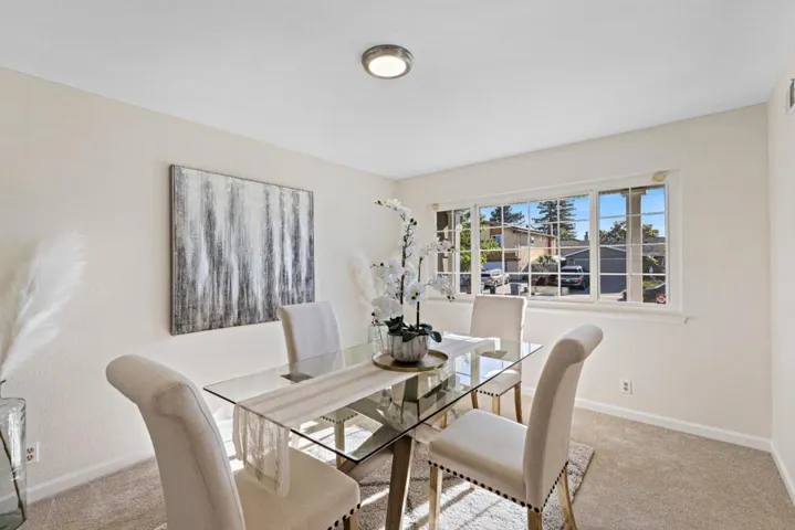 the spacious room faces the front of the home opposite the living room