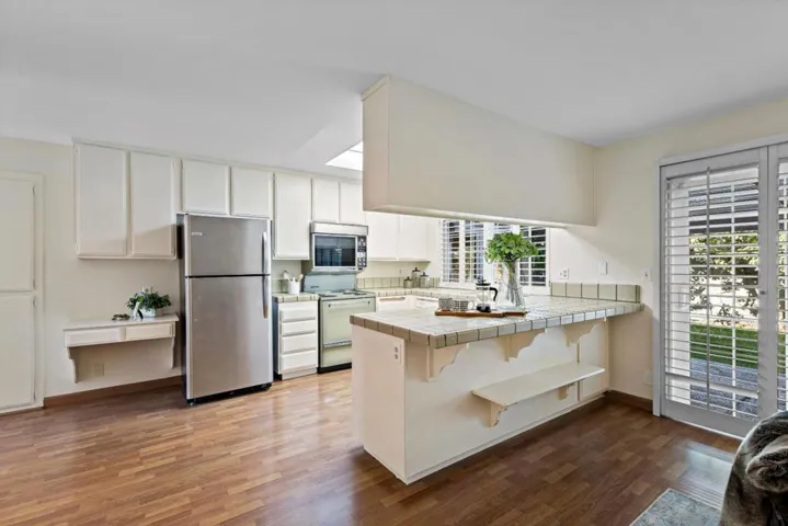 bright and airy kitchen opens to family room