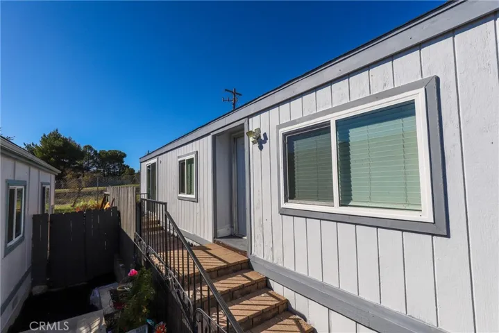 Steps lead you up to the front door.