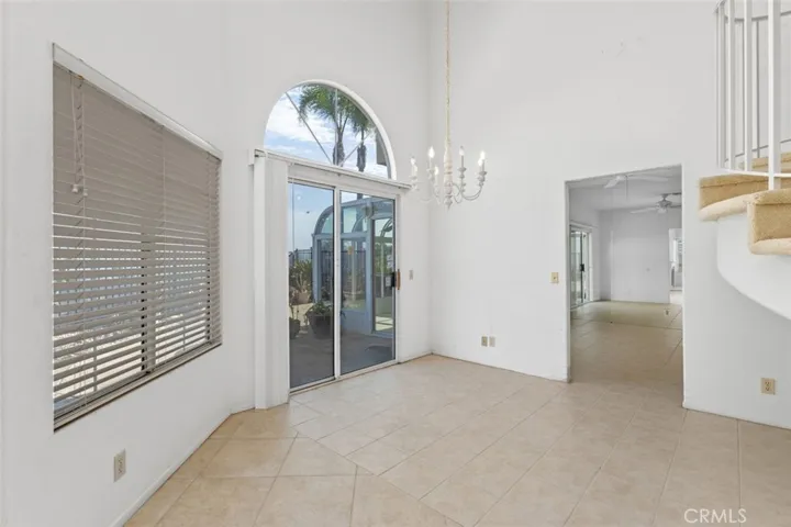 Living room with a sliding door to the rear patio.