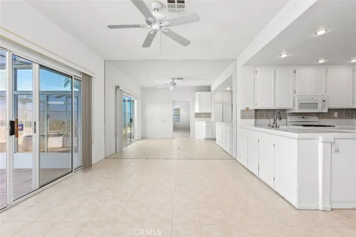 Family room and mirrowed wall.