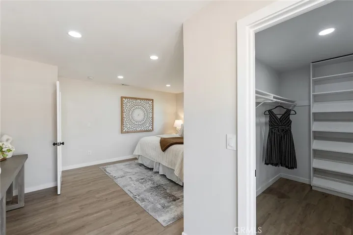 The walk in closet even has a shoe rack