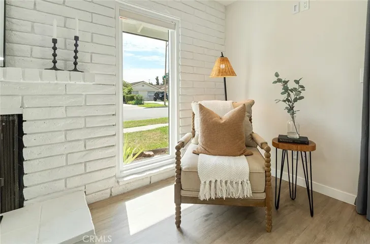 Lots of light from these unusual windows framing the fireplace