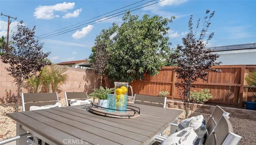 The neighbor's tree is handing avocados to you. Lots of sky in this backyard
