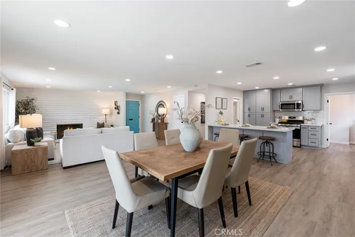 The living room blends with the dining area and kitchen