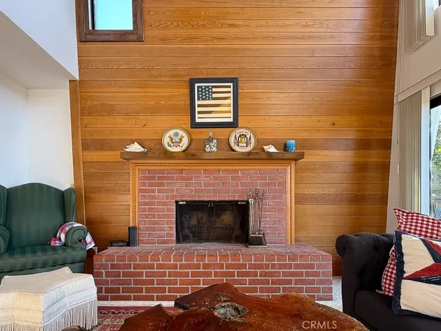 Living Room with Wood Burning Fireplace