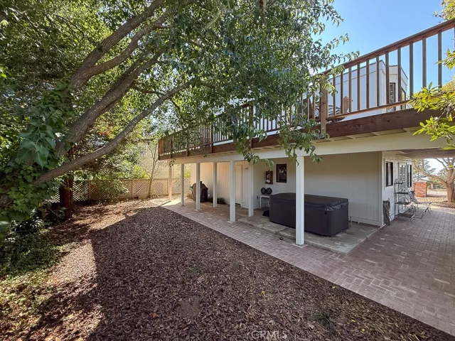 Backyard with path to front patio