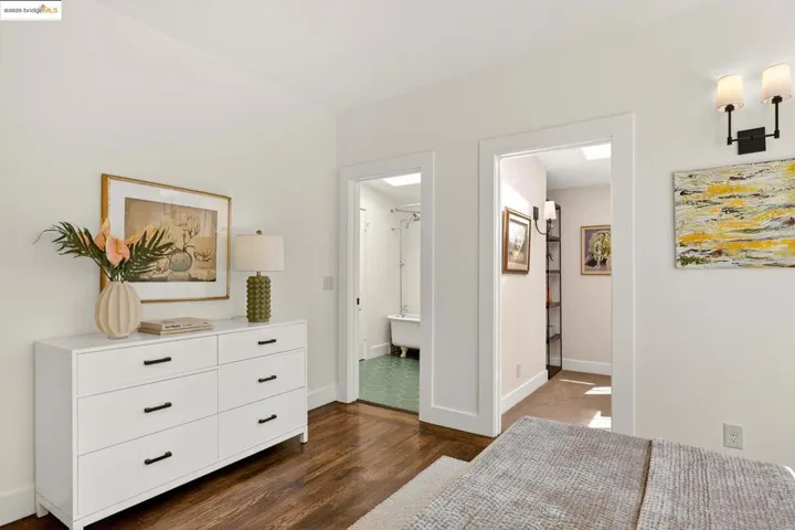 Primary bedroom, looking to dressing room/office and bathroom